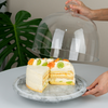 Marble rotating cake tray with glass cover